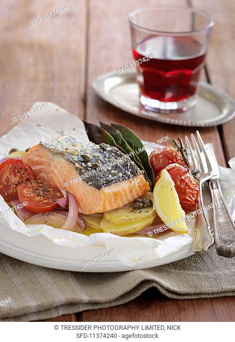 Salmon with vegetables in parchment paper