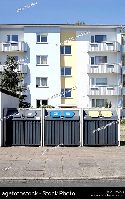 Garbage cans in front of modern residential buildings, Bremen, Germany