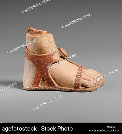 Terracotta aryballos (perfume vase) in the form of a sandaled right foot. Period: Archaic; Date: mid-6th century B.C; Culture: Rhodian; Medium: Terracotta;...