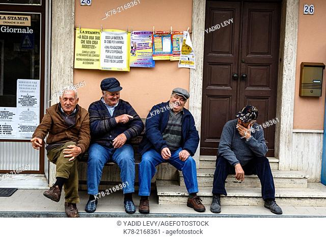 Local elderly men at Monastero Bormida village, Piedmont, Italy