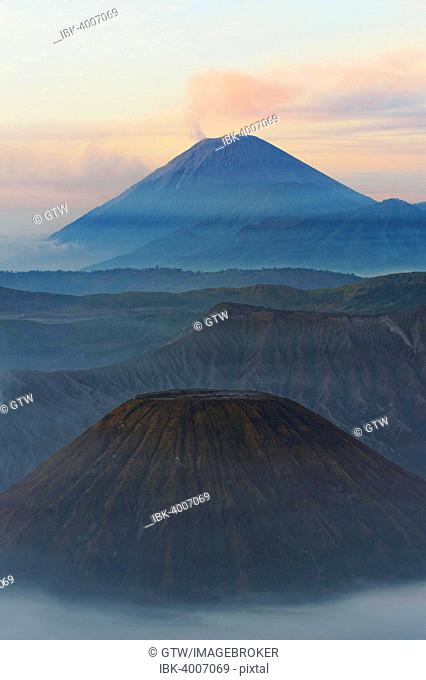 Sunrise over the smoking Gunung Bromo volcano, Bromo-Tengger-Semeru National Park, Java, Indonesia