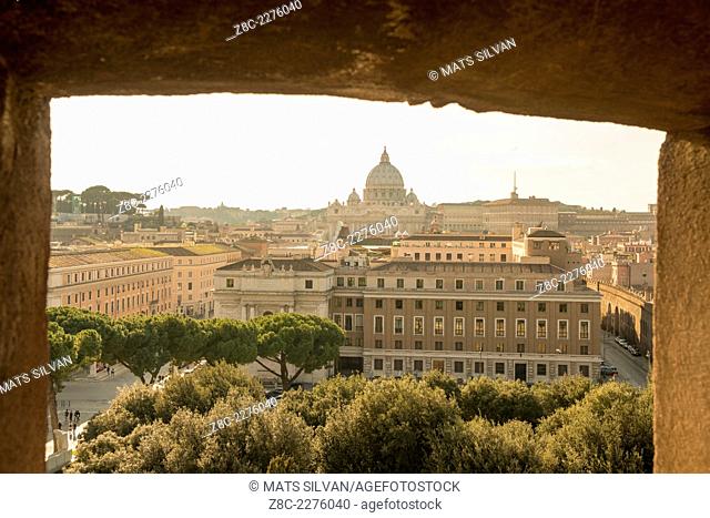 Vatican City seen through an arch in Rome, Italy