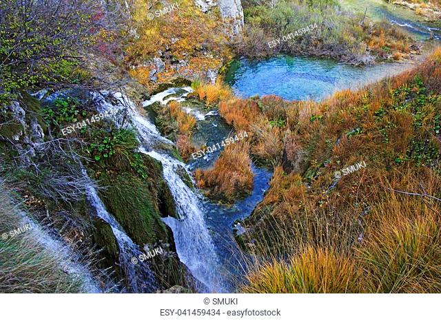 Plitvice Lakes and waterfalls with Autumn colors of National Park in Croatia