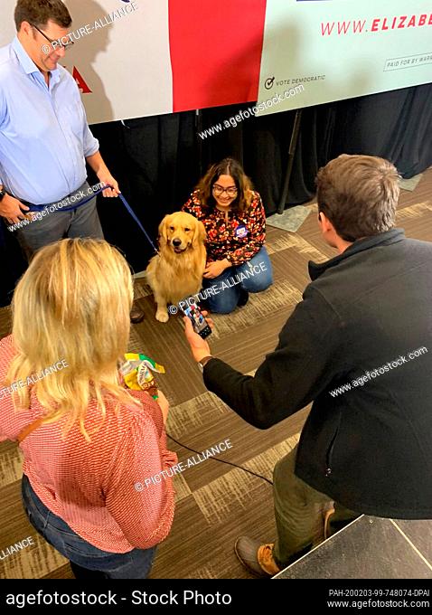 02 February 2020, US, Des Moines: Warren's family dog Bailey is photographed for Selfies with supporters of the Democratic presidential candidate Elizabeth...