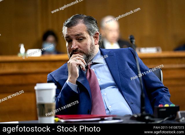 United States Senator Ted Cruz (Republican of Texas) speaks to a staff member during a U.S. Senate Judiciary Committee hearing at the Dirksen Senate Office...