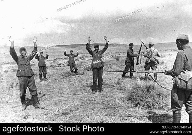 Nazi Prisoners in Russian Hands. Nazi troops who have been hiding in the fields in the Northern Caucasus area are found in mopping up operations and surrender...