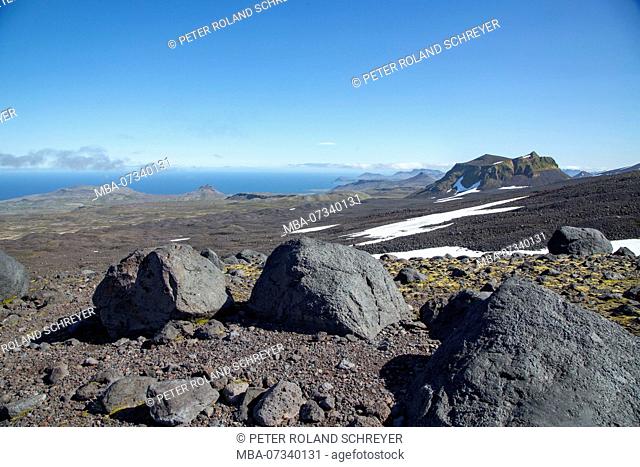 Northern slopes of the Snaefellsjökull, lava field, Breidafjord in the background, blue sky over blue sea, extreme vastness
