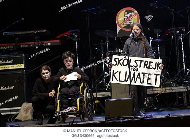 Swedish climate activist Greta Thunberg delivers a speech after a mass climate march to demand urgent action on the climate crisis from world leaders attending...
