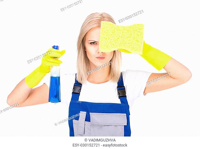 Portrait of female professional cleaner in uniform on the white background