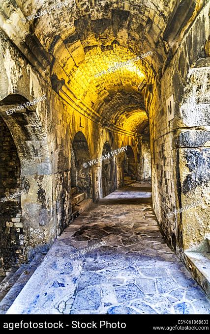 Tunnel Passageway Ancient Classical Roman Amphitheatre Arena Nimes Gard France. Built in 70 AD Used now for bull fights and sports events