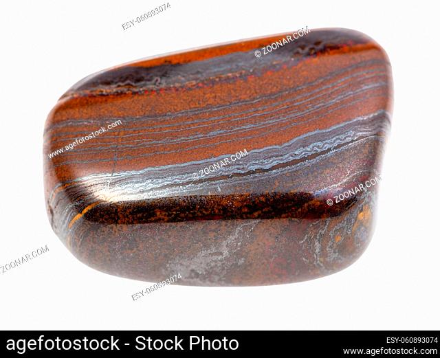 closeup of sample of natural mineral from geological collection - tumbled Jaspillite gemstone isolated on white background