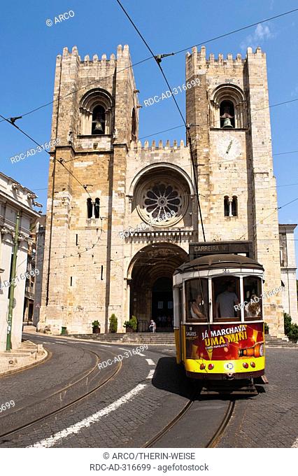 Traditional tram car, in front of Lisbon Cathedral, Alfama district, Lisbon, Portugal / Se de Lisboa, Patriarchal Cathedral of St Mary Major