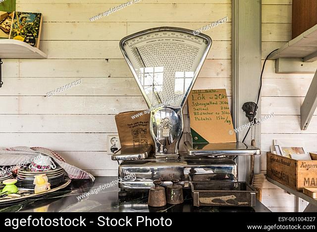Rensmur, Sala Vastmanland County , Sweden - 08 06 2019 Vintage balance in a farmers garden house, selling vegetables