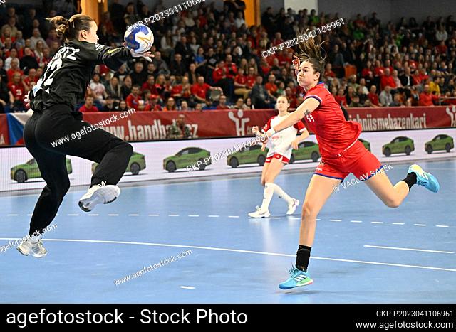 Dominika Zachova of Czech Republic shots a goal during the play off match for advance to women's handball world championship Czech Republic vs Switzerland in...