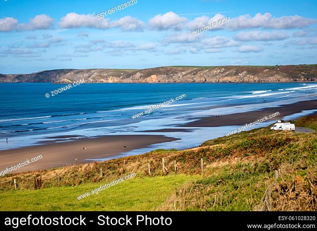 NEWGALE, PEMBROKESHIRE/UK - SEPTEMBER 13 : View of Newgale beach in Pembrokeshire on September 13, 2019. Unidentified people
