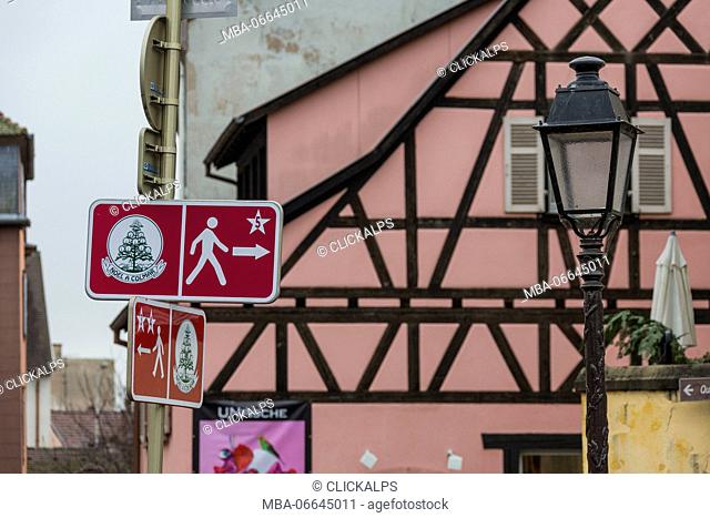 Road signs and street lamp frame the typical medieval old town Petite Venise Colmar Haut-Rhin department Alsace France Europe