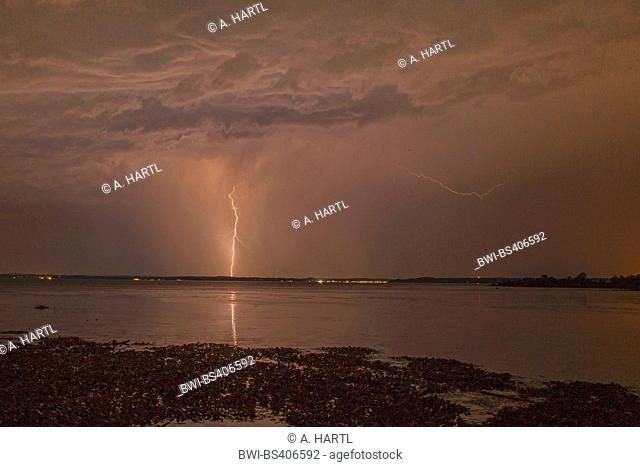 thunderstorm with lightning at the Chiemsee lakefront, Germany, Bavaria, Lake Chiemsee