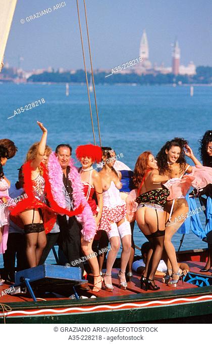 Tinto Brass and the female cast of the film 'Trasgredire', Mostra del Cinema, Venice, 1999