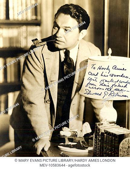 The Hollywood film star Edward G. Robinson, a friend of Hardy Amies. He has inscribed the photo: To Hardy Amies and his coworkers