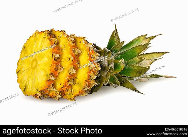 Pineapple slice with top and slices isolated on white background