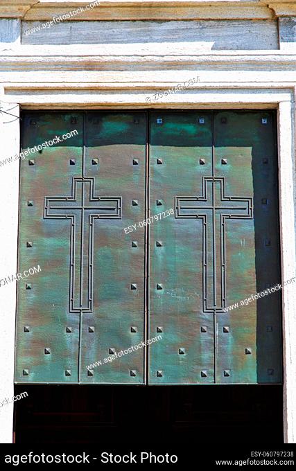 abstract church door  in italy  lombardy  column the milano old   closed brick