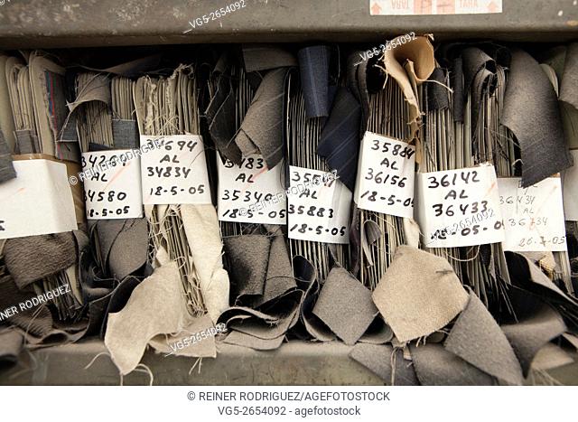 archive of textile samples. production of fine woolen fabrics for suits - in a factory in Sabadell, Spain