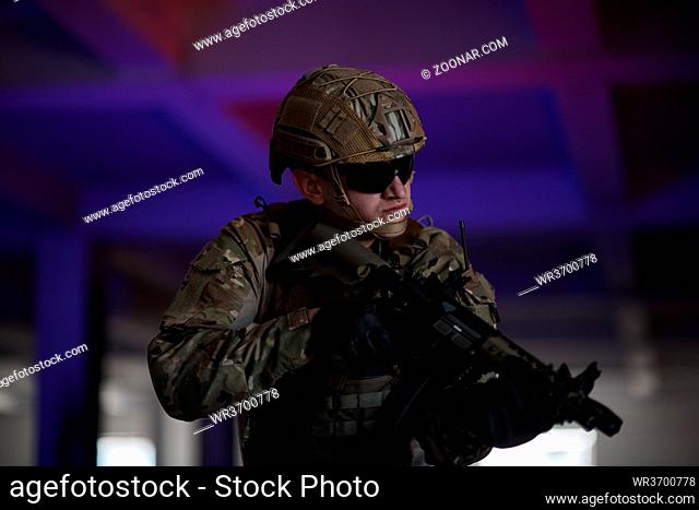 modern warfare soldier in urban environment battlefield aiming on weapons and scanning for target