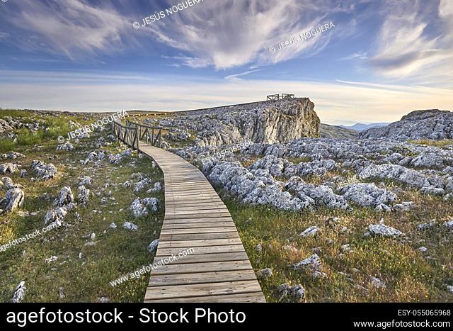 Wooden walkway for public use over the limestone rock landscape in Loja, Granada. Spain