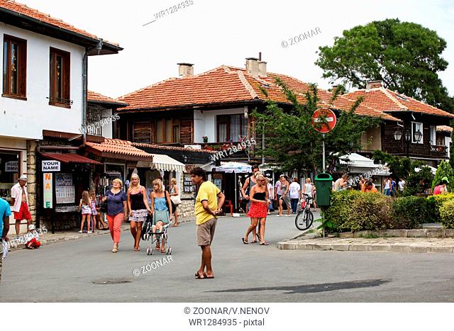 Nesebar, Bulgaria - 06/23/2013: People visit Old Town on June 23, 2013 day of Nessebar, Bulgaria. Nessebar in 1956 was declared as museum city