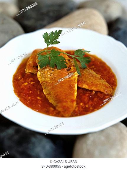 Red mullet in tomato sauce with saffron and ginger