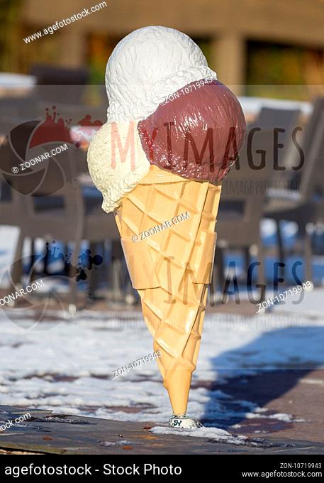 Ice cream cone in front of an ice cream bar