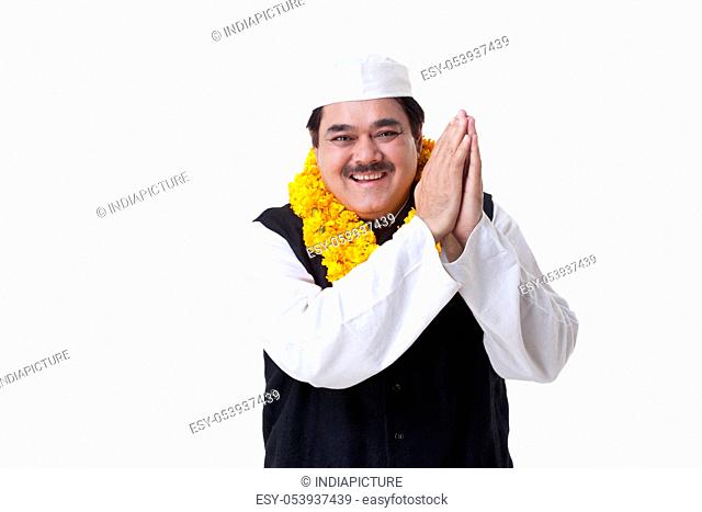 Happy politician greeting over white background