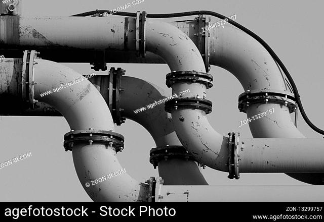 Water pipes on the construction site in black and white and a clear sky
