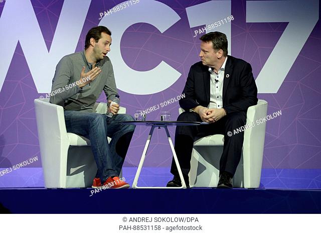 The head of the robot car program of the driving company Uber, Anthony Levandowski (l), speaking at the Mobile World Congress in Barcelona, Spain
