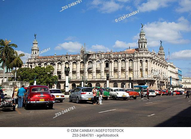 Vintage American cars in front of the Grand Theater building in Central Havana, Cuba, West Indies, Central America