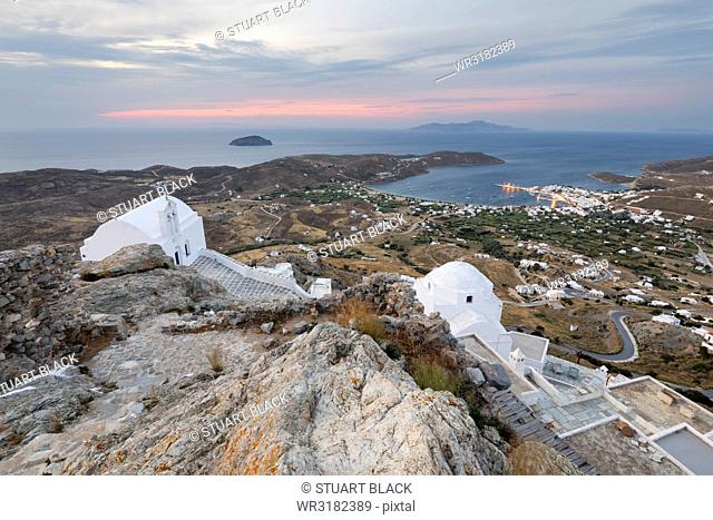View of Livadi Bay and white Greek Orthodox churches from atop Pano Chora, Serifos, Cyclades, Aegean Sea, Greek Islands, Greece