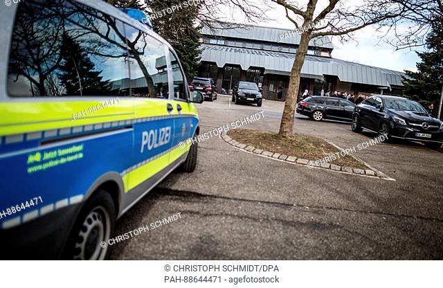 Police cars park in front of an empty festival hall in Gaggenau, Germany, 2 March 2017. The Turkish Minister of Justice was meant to speak in the hall in the...