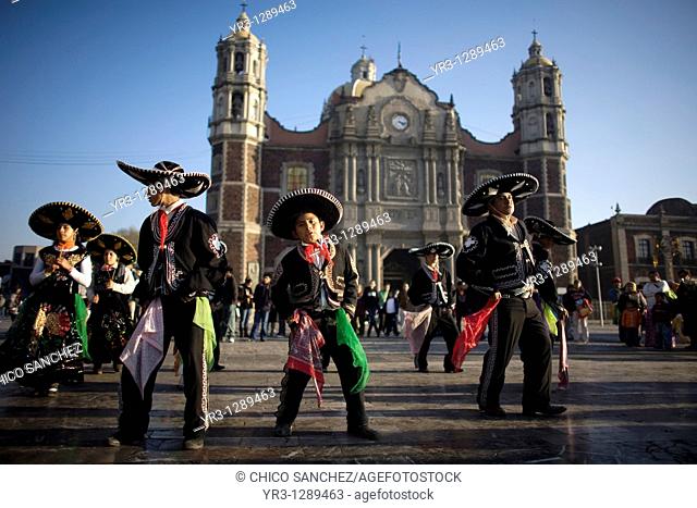 Pilgrims dance outside the Our Lady of Guadalupe Basilica in Mexico City, December 8, 2010  Hundreds of thousands of Mexican pilgrims converged on the Basilica