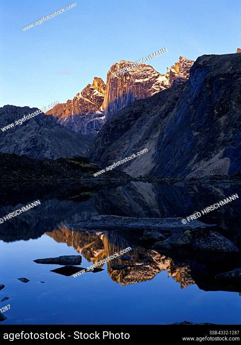 Arrigetch Peaks reflected in alpine lake, Brooks Range, Gates of the Arctic National Park, Alaska