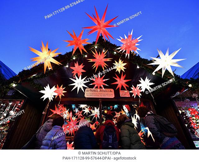 The christmasmarket opens in Erfurt, Germany, 28 November 2017. Some 200 stand owners offer sweets, food, spices and handcrafted pieces in front of the medieval...