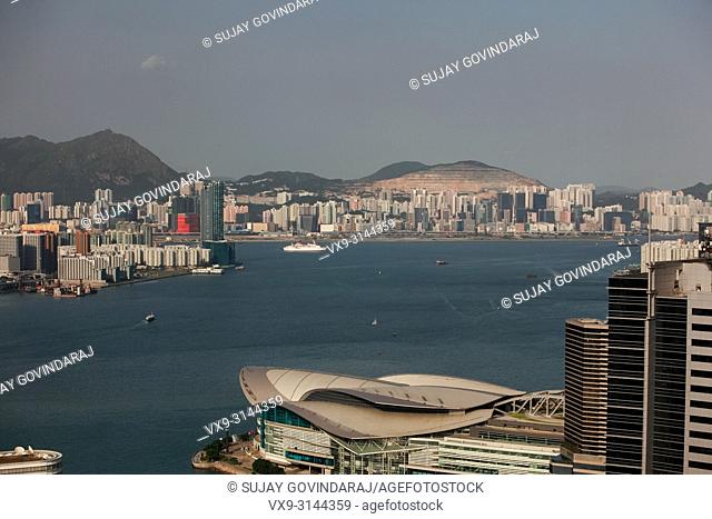 Hong Kong, China - September 25, 2009: Wide view high rise towers, modern buildings and vessels on the sea in Hong Kong