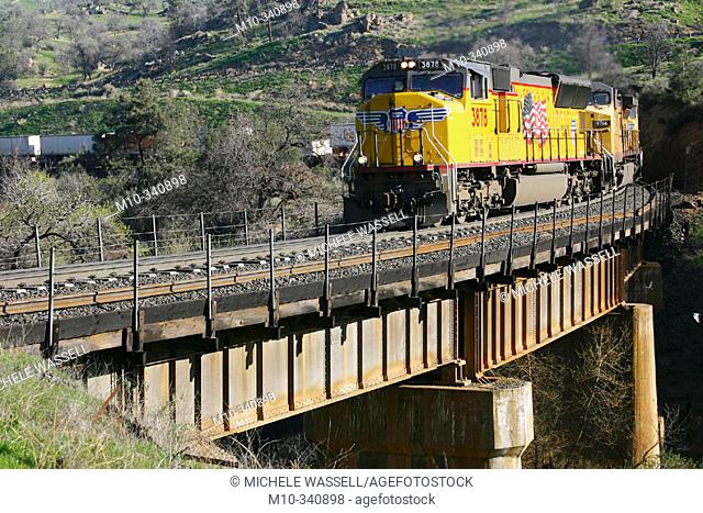 Union Pacific Train crossing over an old bridge from the 1800's traveling from Bakersfield heading to Tehachapi in the early morning hours