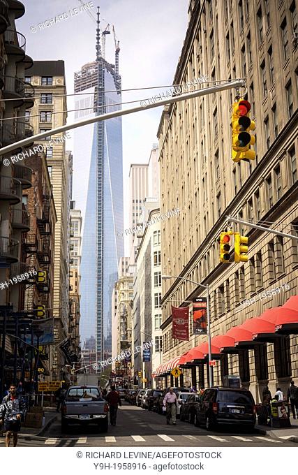 One World Trade Center in Lower Manhattan in New York is seen from Fulton Street. The final antenna installation is being put on hold for better weather but...