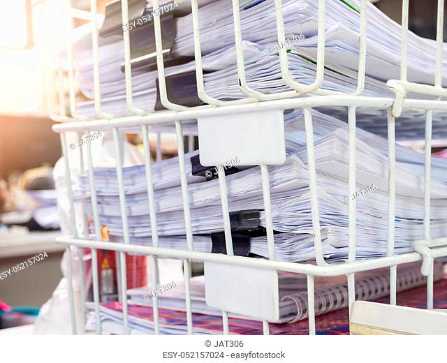 Pile of unfinished documents on office desk, Stack of business paper
