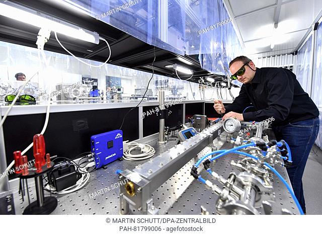 Scientist Arno Klenke working in a lab of the 'Abbe Center of Photonics' in Jena, Germany, 5 July 2016. The new research center for optics and photonics worth...