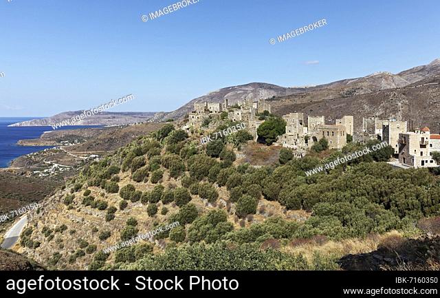 Abandoned village with stone residential towers, view of Messinian Gulf, Vathia, southern Mani peninsula, Laconia, Peloponnese, Greece, Europe