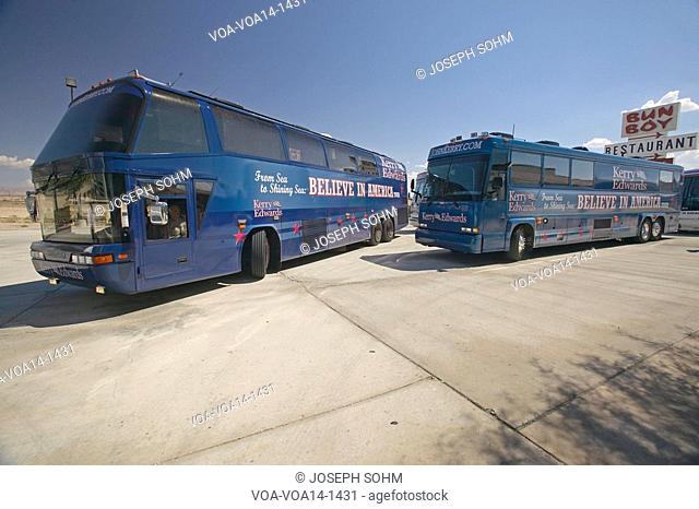 Kerry/Edwards campaign buses during a campaign stop in Baker, California, near Death Valley August 11, 2004 on the Believe in America coast to coast tour