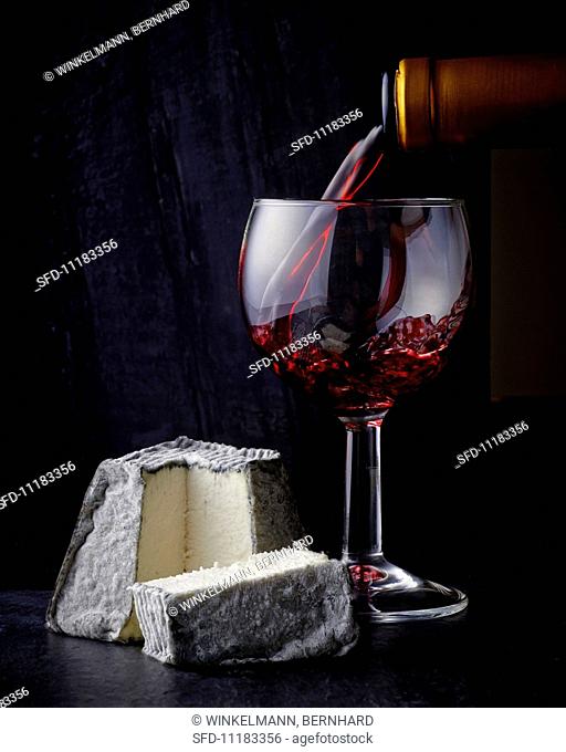 Goat's cheese and a glass of red wine
