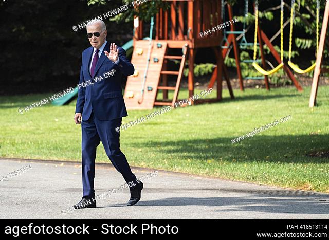 United States President Joe Biden walks on the South Lawn of the White House before boarding Maine One in Washington, DC, US, on Friday, July 28, 2023