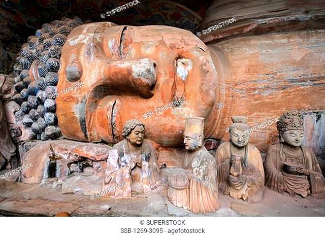 Statues in a temple, Niche of Sakyamuni Entering Nirvana, Dazu, Chongqing, China